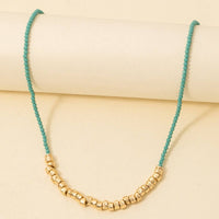 Metallic And Faceted Glass Beaded Necklace: Turquoise