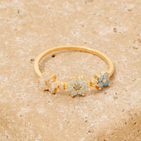 Triple Cubic Zirconia Flowers Dainty Band Ring