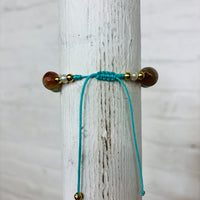 Adjustable Light Blue Beaded Charm Bracelet