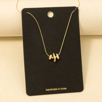 Abstract Metallic Bead Charms Chain Necklace - Gold