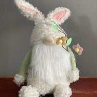 Sitting Gnome with Spring Flower