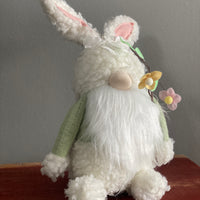 Sitting Gnome with Spring Flower