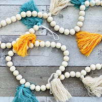 66'' Natural Wood Bead Garland with Tassels