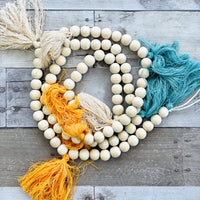 66'' Natural Wood Bead Garland with Tassels