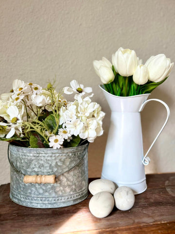 White Floral Arrangement In Metal Bucket