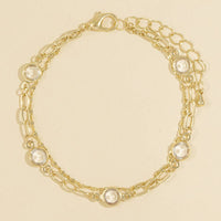 Layered Bezel Crystal Station Bracelet: Gold / Cubic Zirconia