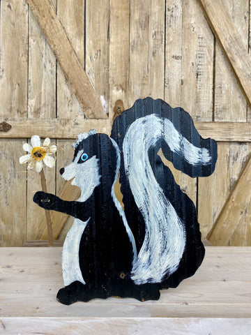 Metal Skunk With Flower