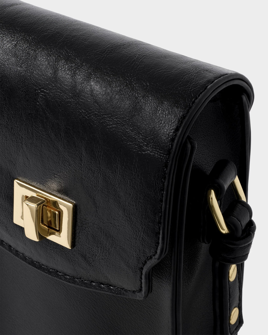 Orin Twist Lock Distressed Slim Bag - Black