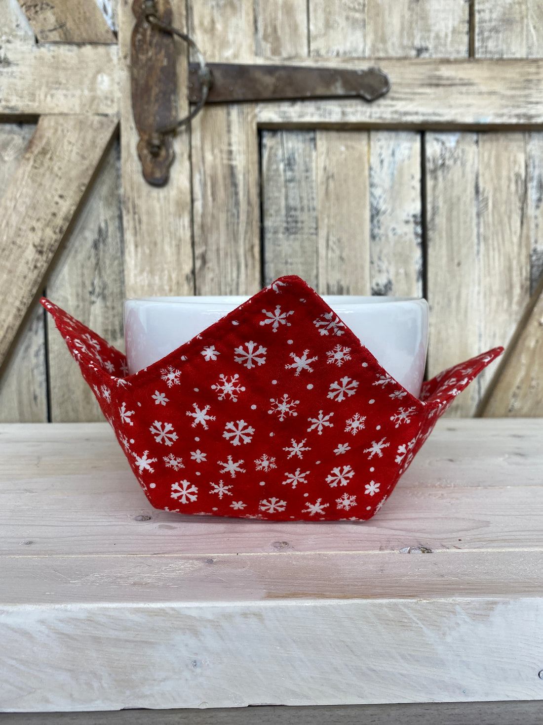 White Snowflake Red Bowl Cozy