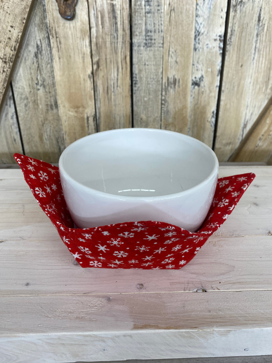 White Snowflake Red Bowl Cozy